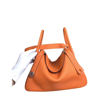 Hermès Lindy 26 Orange Cow Leather Golden or Palladium Hardware