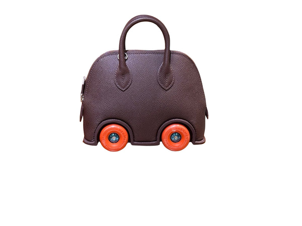 Hermès Bolide on Wheels Saddle Red Premium Cow Leather with Orange Wheels